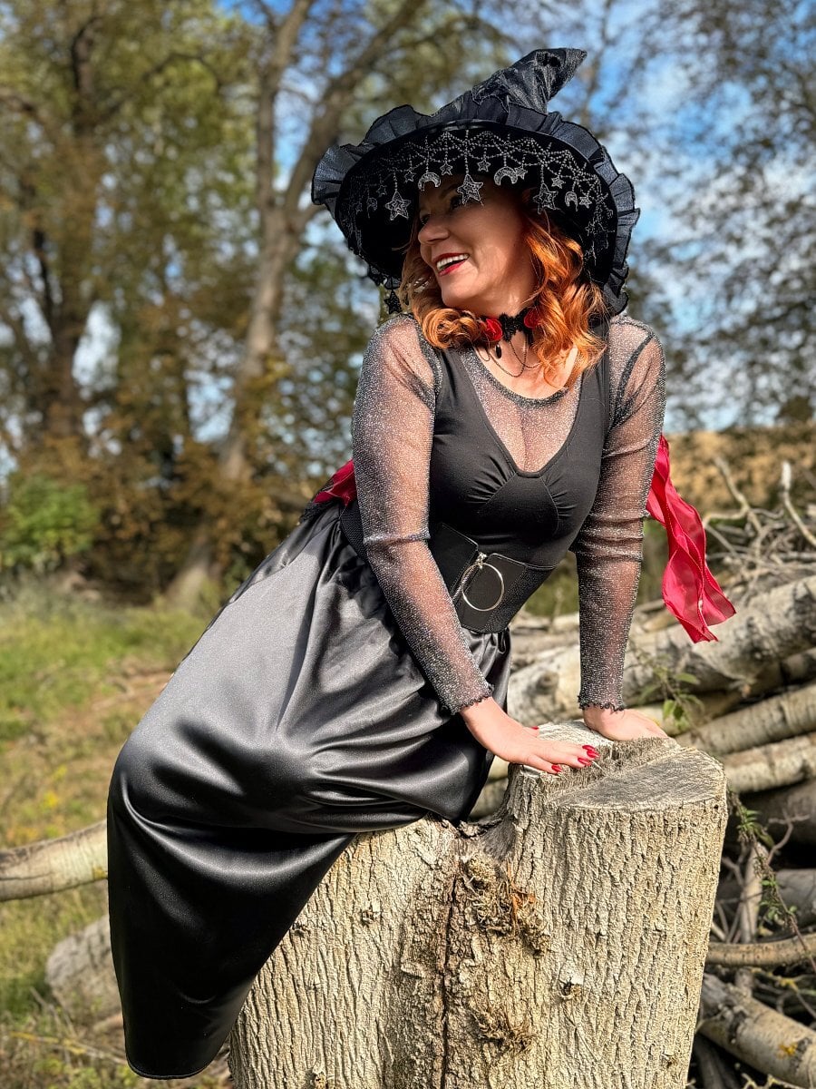 Mature Ella   Elegant, Alluring, And Ready To Enchant You This Halloween. backdrop