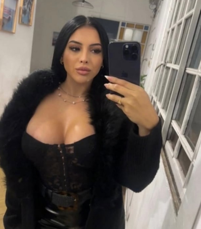 Busty Latino Brunette, Waiting For You! backdrop