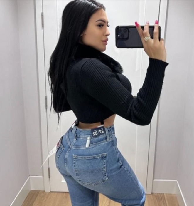 Busty Latino Brunette, Waiting For You! backdrop