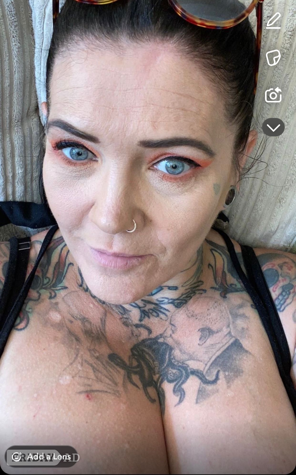 Roxy French Tattooed Medway Milf  backdrop